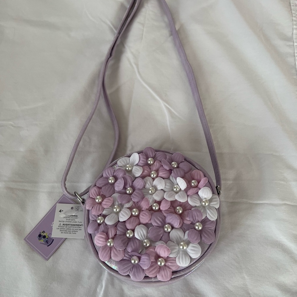 NWT: Charming Purple and Pink Crossbody Bag with Floral Appliqués and glitter.